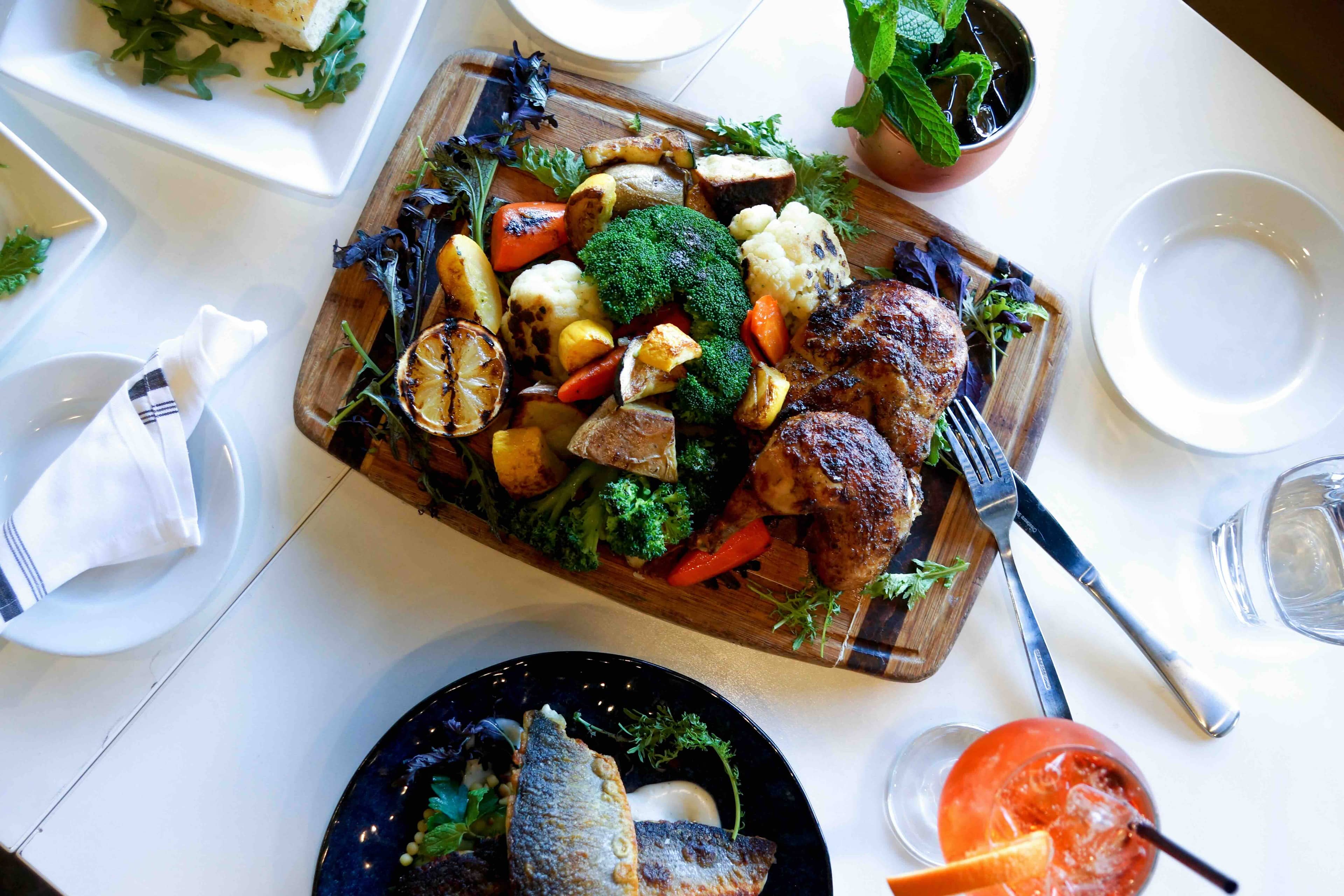 Family-style roasted chicken board at RoVino